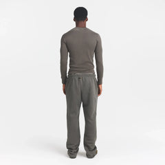 SKIMS COTTON RIB MENS HENLEY | JUNGLE ON A MODEL BACK VIEW @ | FOCUS: 0.0, 1.0, 0.9