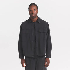 WOVEN MENS RELAXED SHIRT | ONYX ON A MODEL SIDE VIEW @ | FOCUS: 0.0, 1.0, 0.9