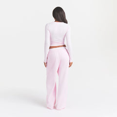 COTTON RIB ZIP UP TOP | CHERRY BLOSSOM ON A MODEL BACK VIEW @ | FOCUS: 0.0, 1.0, 0.9