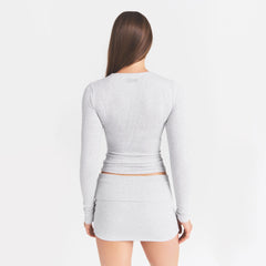 COTTON RIB ZIP UP TOP | LIGHT HEATHER GREY ON A MODEL BACK VIEW @ | FOCUS: 0.0, 1.0, 0.9