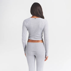ESSENTIAL SWEATERS WRAP SWEATER | MID HEATHER GREY & LAYS FLAT ON A WHITE BACKGROUND | FLT @ | FOCUS: 0.0, 1.0, 0.9