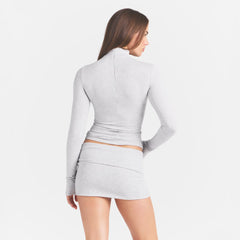 COTTON JERSEY TURTLENECK LONG SLEEVE | LIGHT HEATHER GREY ON A MODEL BACK VIEW @ | FOCUS: 0.0, 1.0, 0.9