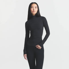 COTTON JERSEY TURTLENECK LONG SLEEVE | SOOT ON A MODEL FRONT VIEW @ | FOCUS: 0.0, 1.0, 0.9