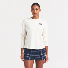 SKIMS FOR TEAM USA WORN IN JERSEY OLYMPIC LONG SLEEVE T-SHIRT | ECRU ON A MODEL SIDE VIEW @ | FOCUS: 0.0, 1.0, 0.9
