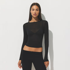 SHEER COTTON LONG SLEEVE T-SHIRT | SOOT ON A MODEL SIDE VIEW | FOCUS: 0.0, 1.0, 0.9