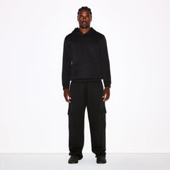 FLEECE LOUNGE MENS CLASSIC HOODIE | WASHED ONYX ON A MODEL FRONT VIEW @ | FOCUS: 0.0, 1.0, 0.9