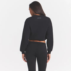 COTTON FLEECE BOMBER | ONYX ON A MODEL SIDE VIEW @ | FOCUS: 0.0, 1.0, 0.9