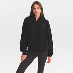COTTON FLEECE MOCK NECK QUARTER ZIP WITH EMBOSSED LOGO | ONYX ON A MODEL SIDE VIEW @ | FOCUS: 0.0, 1.0, 0.9