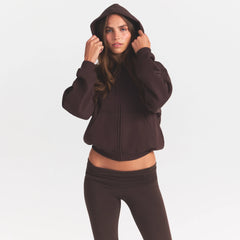 COTTON FLEECE ZIP UP HOODIE WITH EMBOSSED LOGO | ESPRESSO ON A MODEL SIDE VIEW @ | FOCUS: 0.0, 1.0, 0.9