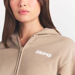 COTTON FLEECE CLASSIC ZIP UP HOODIE | LATTE ON A MODEL SIDE VIEW @ | FOCUS: 0.0, 1.0, 0.9