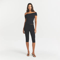 SMOOTH LAYERS SHORT SLEEVE TOP | OBSIDIAN ON A MODEL FRONT VIEW @ | FOCUS: 0.0, 1.0, 0.9