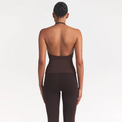 SMOOTH LAYERS HALTER TOP | COCOA ON A MODEL SIDE VIEW @ | FOCUS: 0.0, 1.0, 0.9