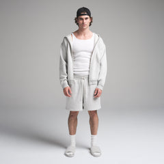 SKIMS COTTON MENS RIB TANK 3-PACK | CHALK ON A MODEL FRONT VIEW | FOCUS: 0.0, 1.0, 0.9