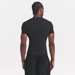 FITS EVERYBODY MENS SLIM T-SHIRT | ONYX ON A MODEL SIDE VIEW @ | FOCUS: 0.0, 1.0, 0.9