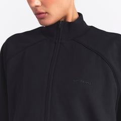 NikeSKIMS MATTE TRICOT OVERSIZED TRACK JACKET | OBSIDIAN ON A MODEL SIDE VIEW @ | FOCUS: 0.0, 1.0, 0.9