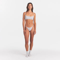 LIGHTWEIGHT COTTON POINTELLE LACE STRING THONG | LIGHT HEATHER GREY ON A MODEL FRONT VIEW | FOCUS: 0.0, 1.0, 0.9