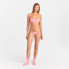 LIGHTWEIGHT COTTON POINTELLE LACE STRING THONG | MELON TONAL ON A MODEL FRONT VIEW @ | FOCUS: 0.0, 1.0, 0.9