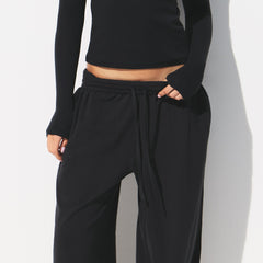 COTTON JERSEY WIDE LEG PANT | SOOT ON A MODEL FRONT VIEW @ | FOCUS: 0.0, 1.0, 0.9