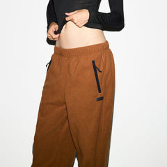 OUTDOOR FLEECE STRAIGHT LEG PANT | CHAI ON A MODEL SIDE VIEW @ | FOCUS: 0.0, 1.0, 0.9