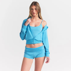 COTTON JERSEY ZIP UP HOODIE | WATER ON A MODEL SIDE VIEW @ | FOCUS: 0.0, 1.0, 0.9