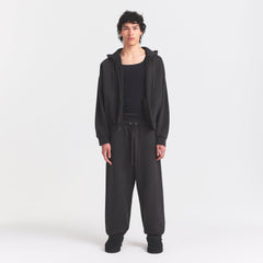 HEAVYWEIGHT FLEECE MENS ZIP UP HOODIE | WASHED ONYX ON A MODEL FRONT VIEW @ | FOCUS: 0.0, 1.0, 0.9
