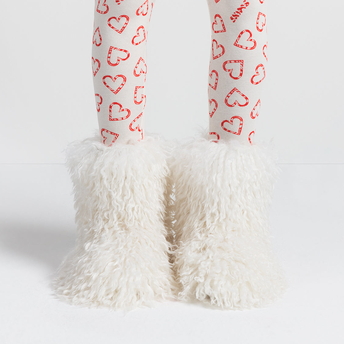 FAUX FUR SHAGGY BOOT | MARBLE ON A MODEL FRONT VIEW @ | FOCUS: 0.0, 1.0, 0.9