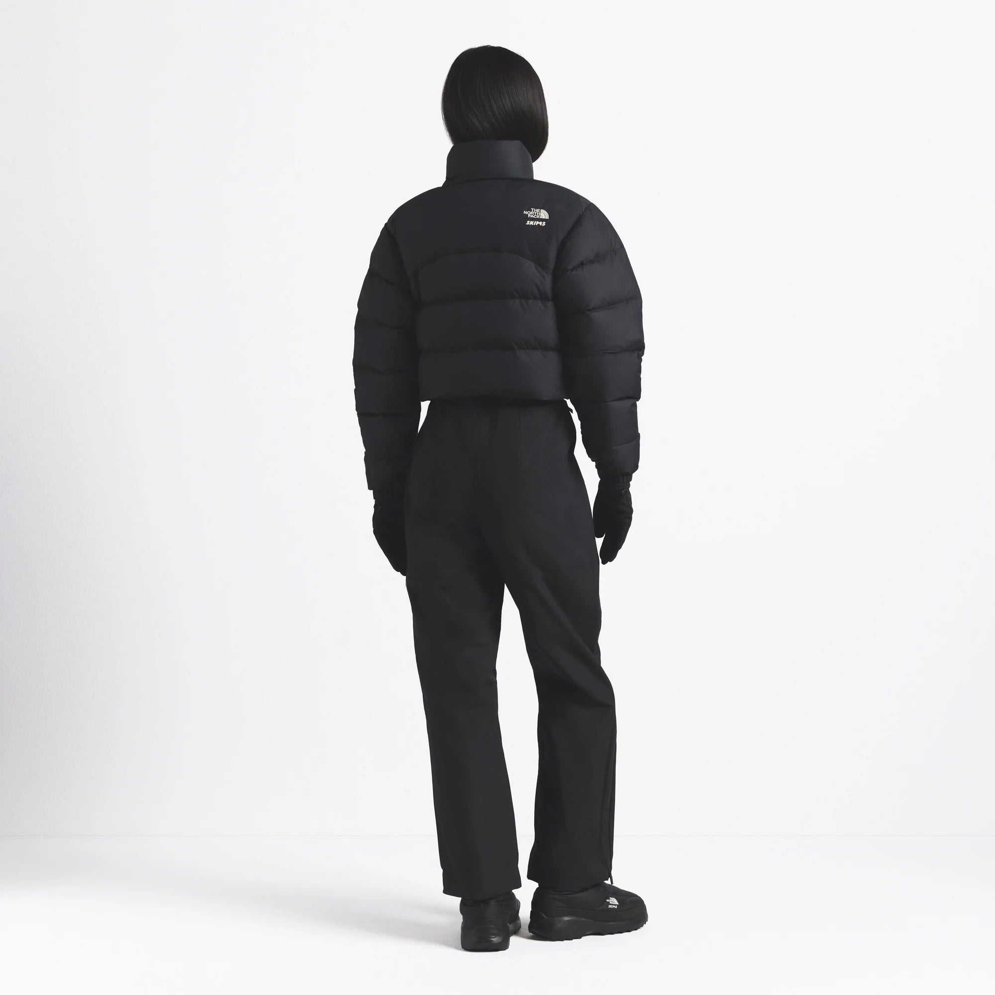 THE NORTH FACE X SKIMS 2000 RETRO NUPTSE JACKET | ONYX ON A MODEL FRONT VIEW @ | FOCUS: 0.0, 1.0, 0.9