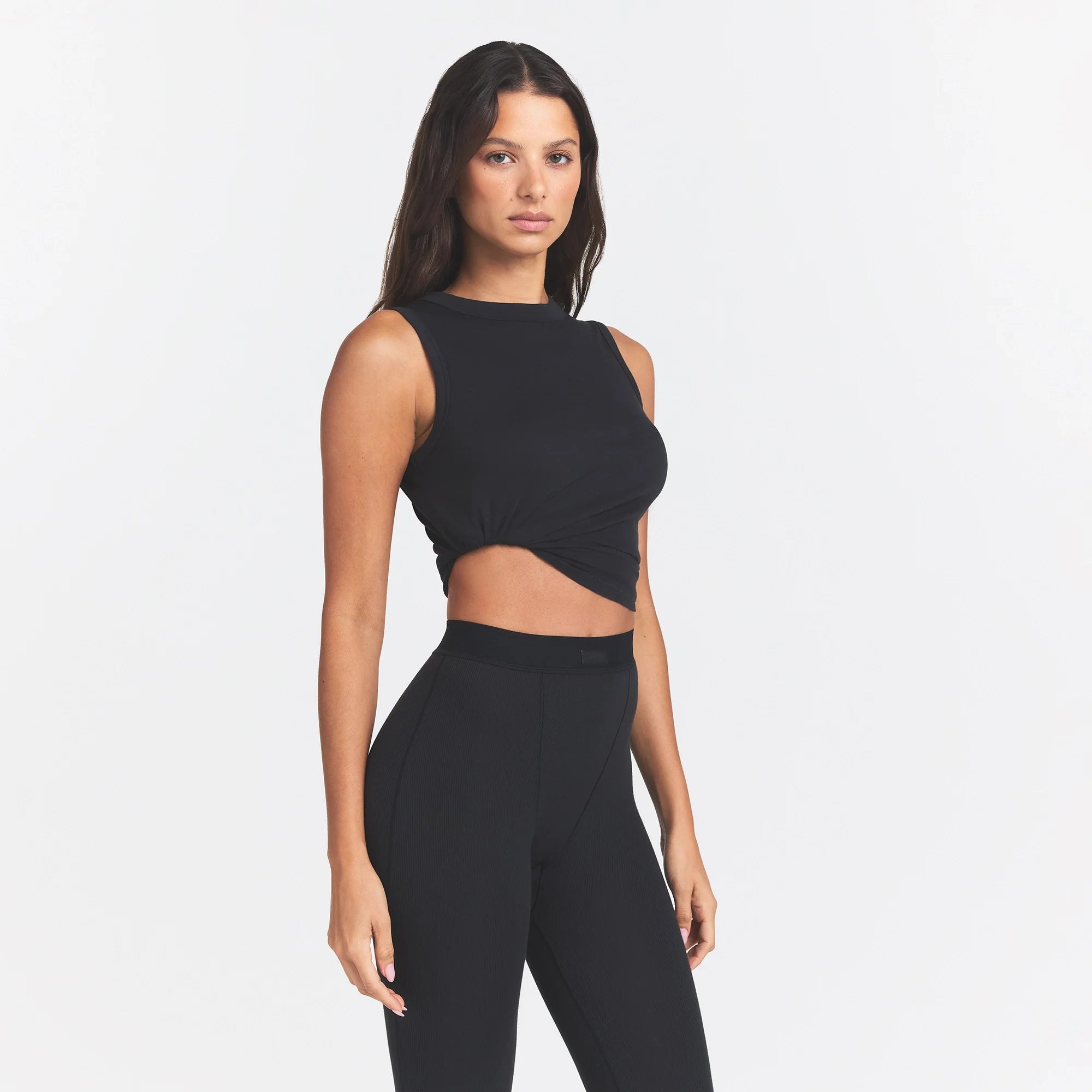 COTTON RIB LEGGING | SOOT ON A MODEL SIDE VIEW @ | FOCUS: 0.0, 1.0, 0.9