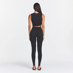 COTTON RIB LEGGING | SOOT ON A MODEL BACK VIEW @ | FOCUS: 0.0, 1.0, 0.9