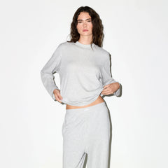 BOYFRIEND LONG SLEEVE T-SHIRT | LIGHT HEATHER GREY ON A MODEL SIDE VIEW @ | FOCUS: 0.0, 1.0, 0.9