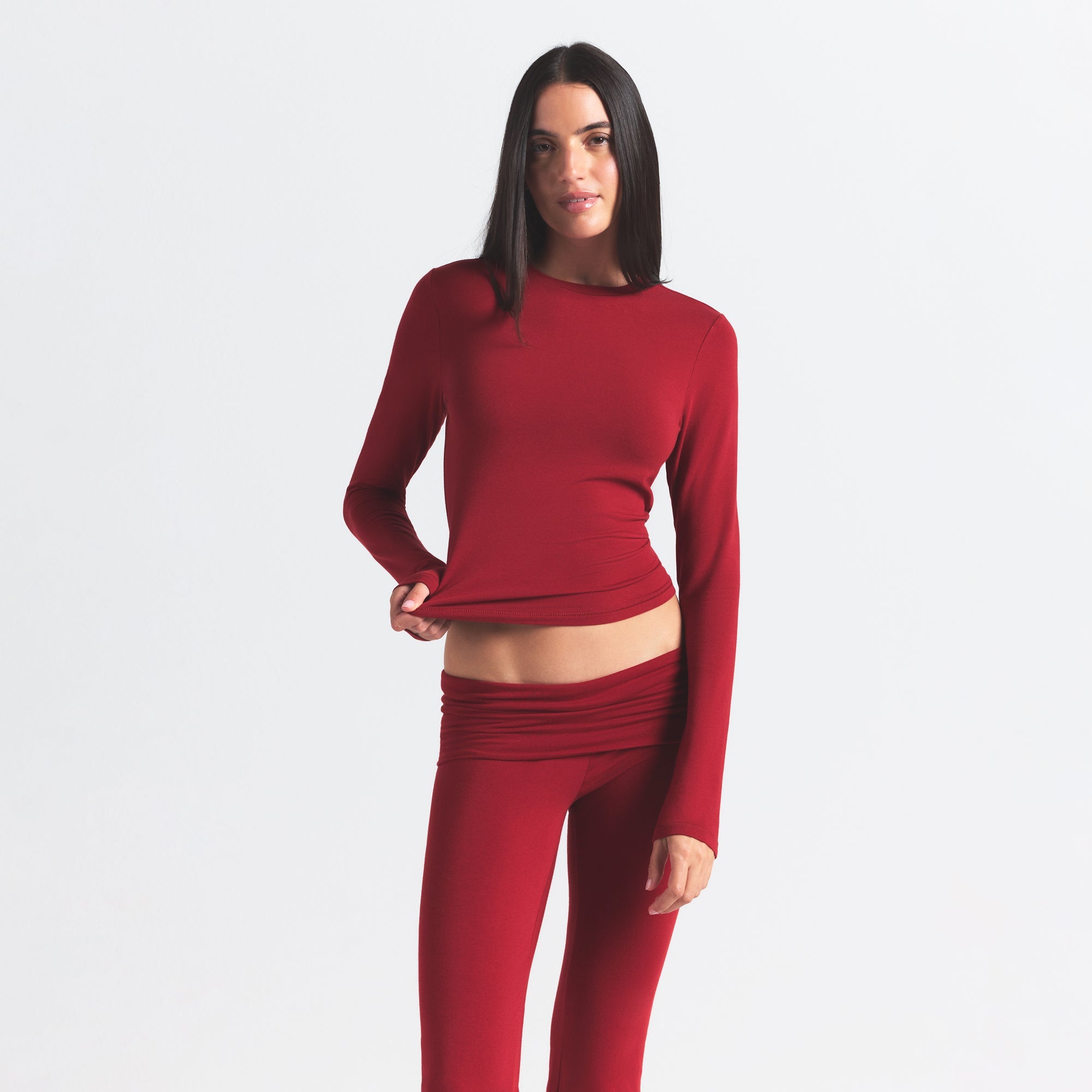 COTTON JERSEY FOLDOVER PANT | BRICK ON A MODEL SIDE VIEW @ | FOCUS: 0.0, 1.0, 0.9