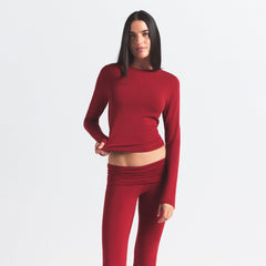 COTTON JERSEY FOLDOVER PANT | BRICK ON A MODEL SIDE VIEW @ | FOCUS: 0.0, 1.0, 0.9