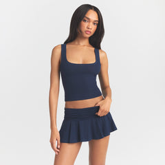 COTTON RIB TANK | NAVY ON A MODEL SIDE VIEW @ | FOCUS: 0.0, 1.0, 0.9