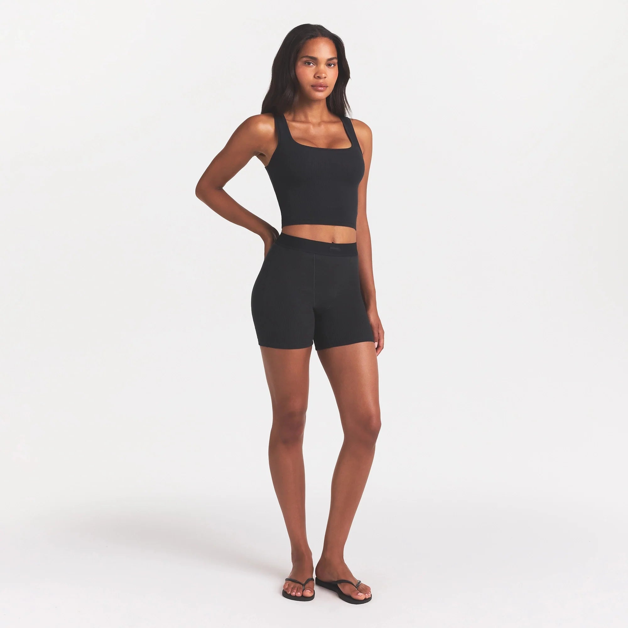 COTTON RIB TANK | SOOT ON A MODEL SIDE VIEW @ | FOCUS: 0.0, 1.0, 0.9