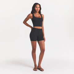 COTTON RIB TANK | SOOT ON A MODEL SIDE VIEW @ | FOCUS: 0.0, 1.0, 0.9