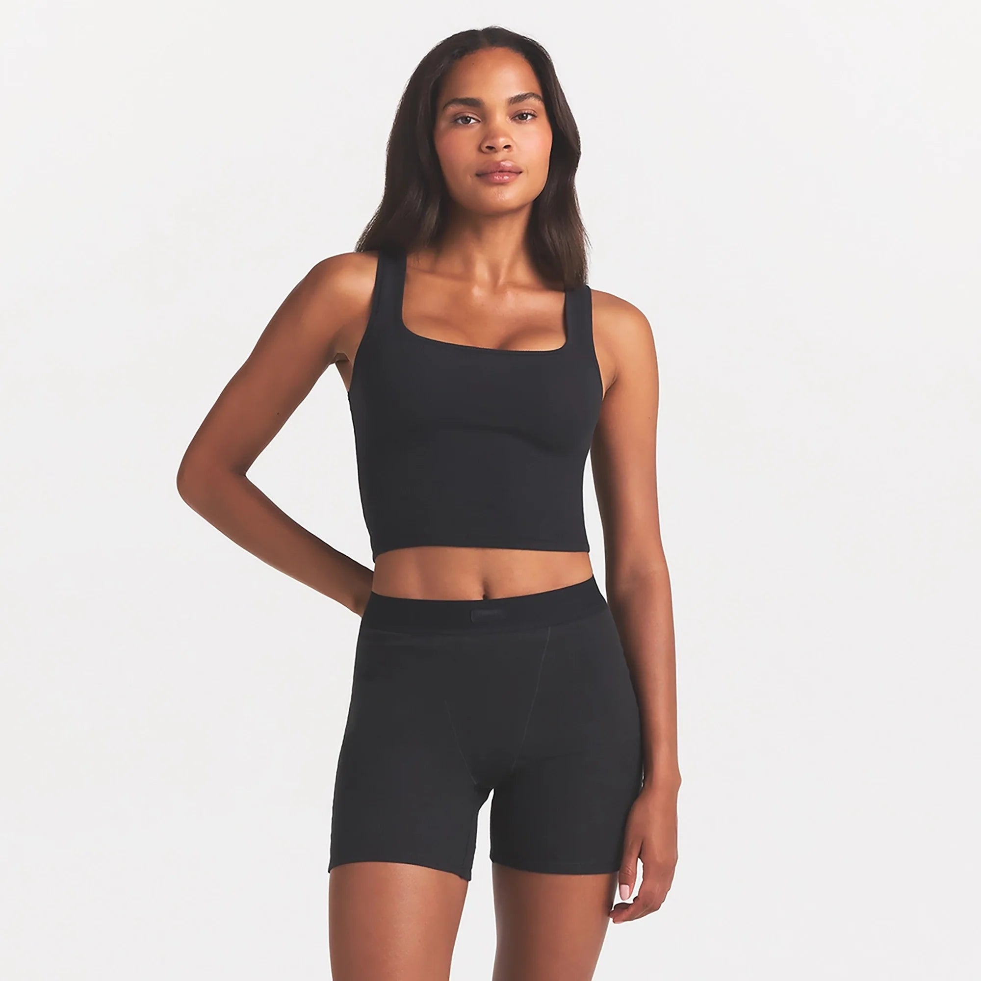 COTTON RIB TANK | SOOT ON A MODEL FRONT VIEW @ | FOCUS: 0.0, 1.0, 0.9