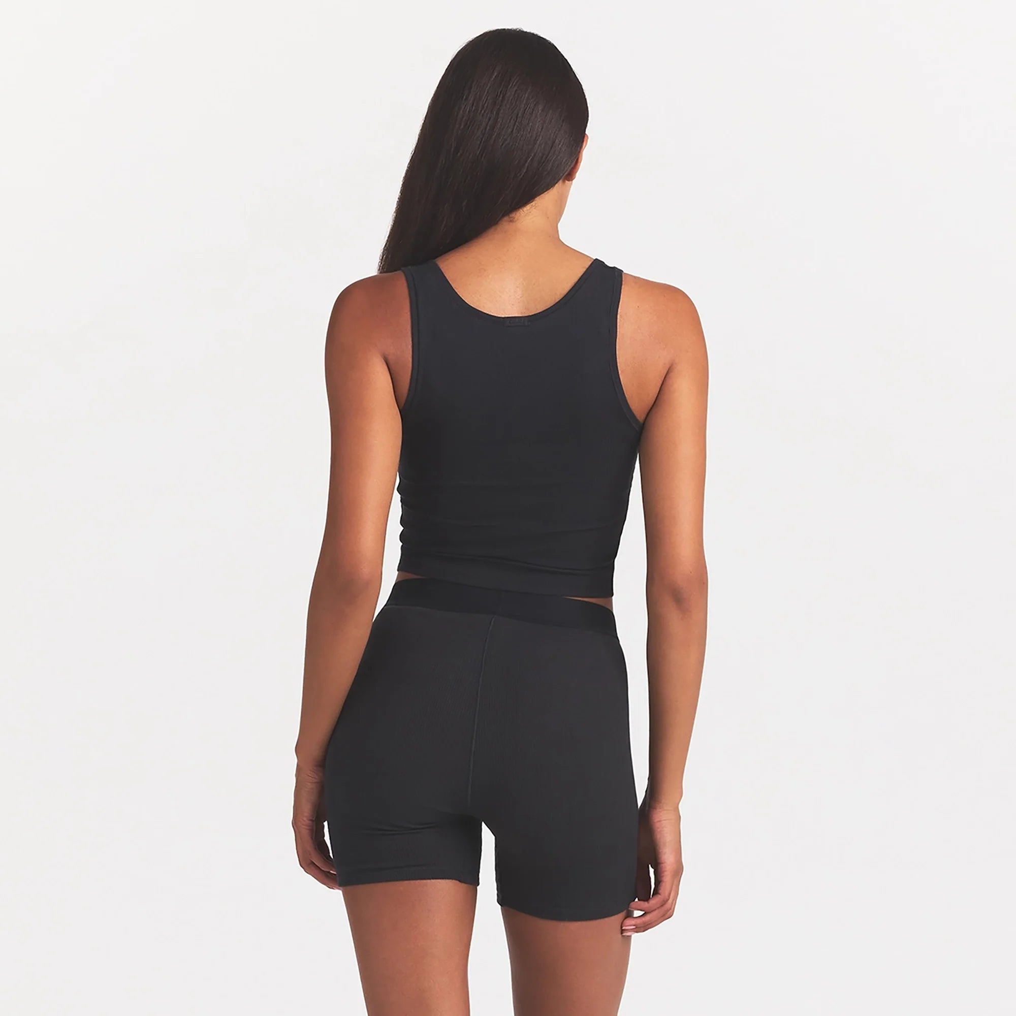 COTTON RIB TANK | SOOT ON A MODEL BACK VIEW @ | FOCUS: 0.0, 1.0, 0.9