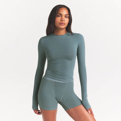 COTTON JERSEY LONG SLEEVE T-SHIRT | KYANITE ON A MODEL FRONT VIEW