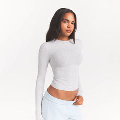 COTTON JERSEY LONG SLEEVE T-SHIRT | LIGHT HEATHER GREY ON A MODEL SIDE VIEW @ | FOCUS: 0.0, 1.0, 0.9