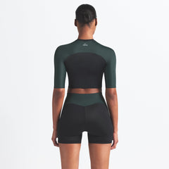 NikeSKIMS SHINE PADDED HALF SLEEVE CROP TOP | OBSIDIAN AND DARK TEAL ON A MODEL BACK VIEW @ | FOCUS: 0.0, 1.0, 0.9