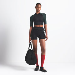 NikeSKIMS SHINE PADDED HALF SLEEVE CROP TOP | OBSIDIAN AND DARK TEAL ON A MODEL FRONT VIEW @ | FOCUS: 0.0, 1.0, 0.9