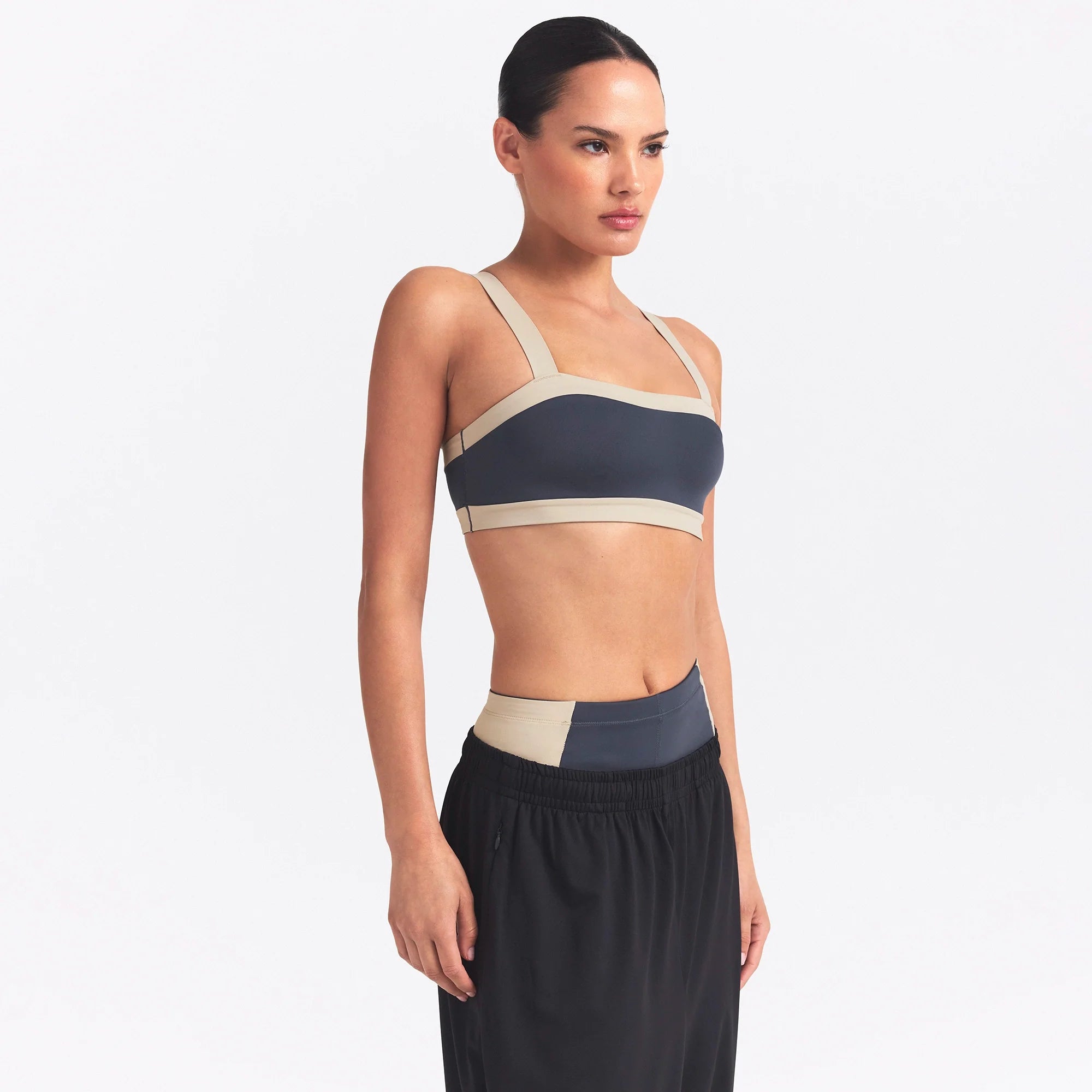 NikeSKIMS MATTE AND SHINE STRAIGHT NECK BRA | DEEP ROYAL/STONE ON A MODEL SIDE VIEW @ | FOCUS: 0.0, 1.0, 0.9