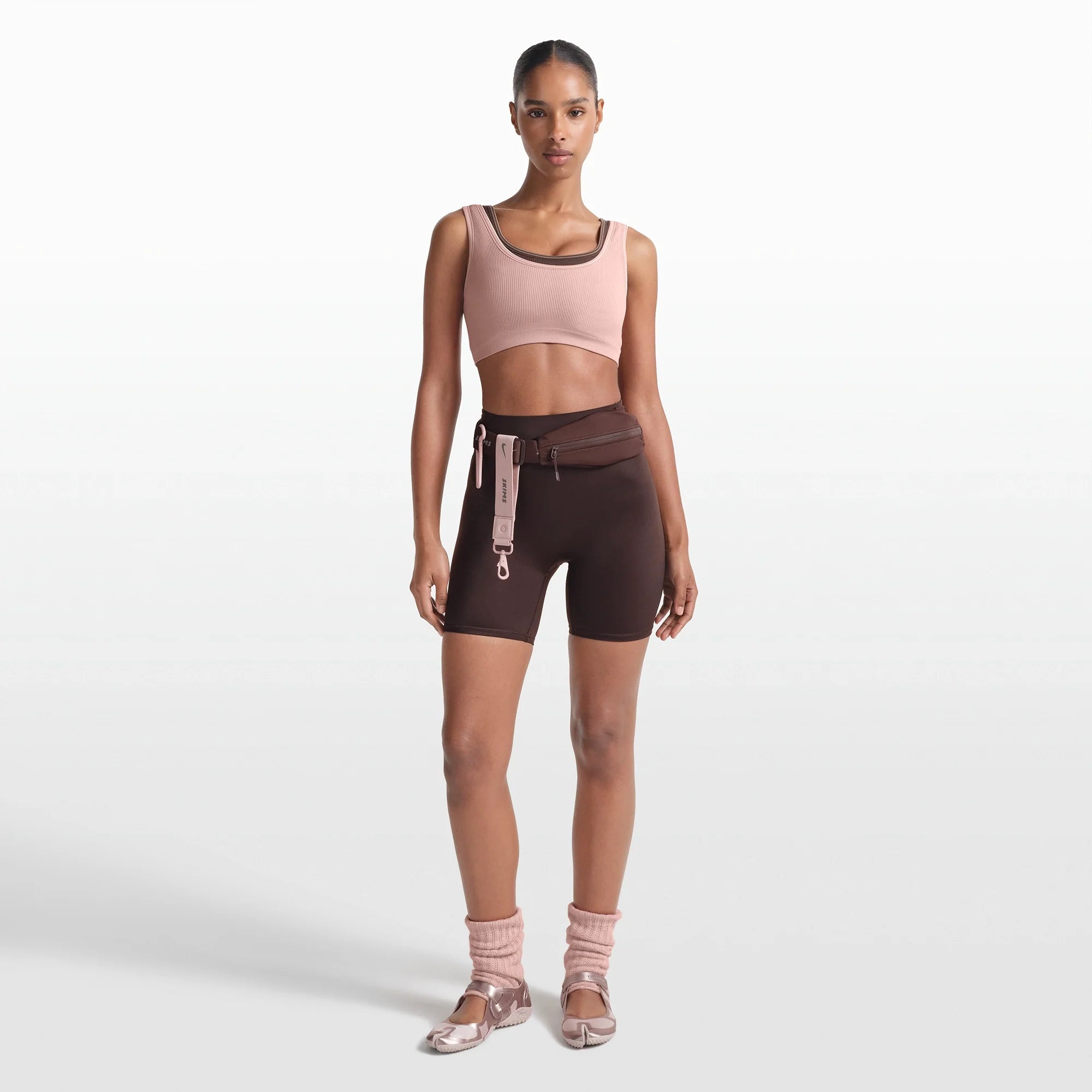 NikeSKIMS RIBBED SEAMLESS SCOOP BRA | HIMALAYAN/ECRU ON A MODEL FRONT VIEW @ | FOCUS: 0.0, 1.0, 0.9