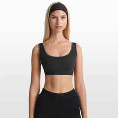 NikeSKIMS RIBBED SEAMLESS SCOOP BRA | OBSIDIAN/ARMOR ON A MODEL FRONT VIEW @ | FOCUS: 0.0, 1.0, 0.9