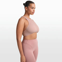 NikeSKIMS RIBBED SEAMLESS RACER FRONT BRA | HIMALAYAN ON A MODEL FRONT VIEW @ | FOCUS: 0.0, 1.0, 0.9