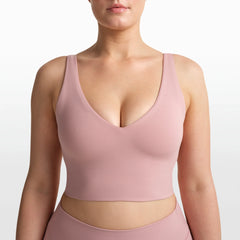 NikeSKIMS MATTE V-NECK BRA TOP | HIMALAYAN ON A MODEL FRONT VIEW @ | FOCUS: 0.0, 1.0, 0.9