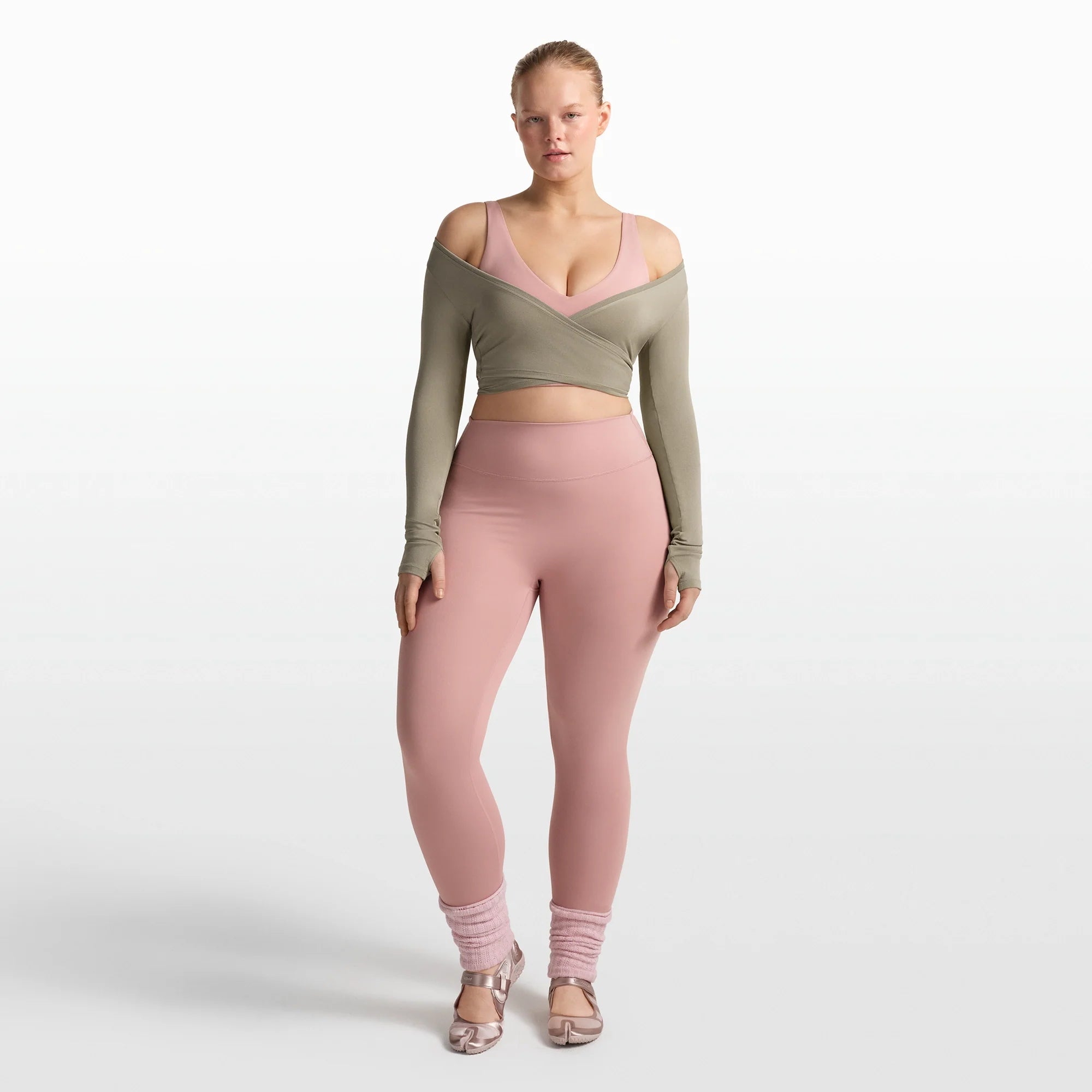 NikeSKIMS MATTE V-NECK BRA TOP | HIMALAYAN ON A MODEL FRONT VIEW @ | FOCUS: 0.0, 1.0, 0.9