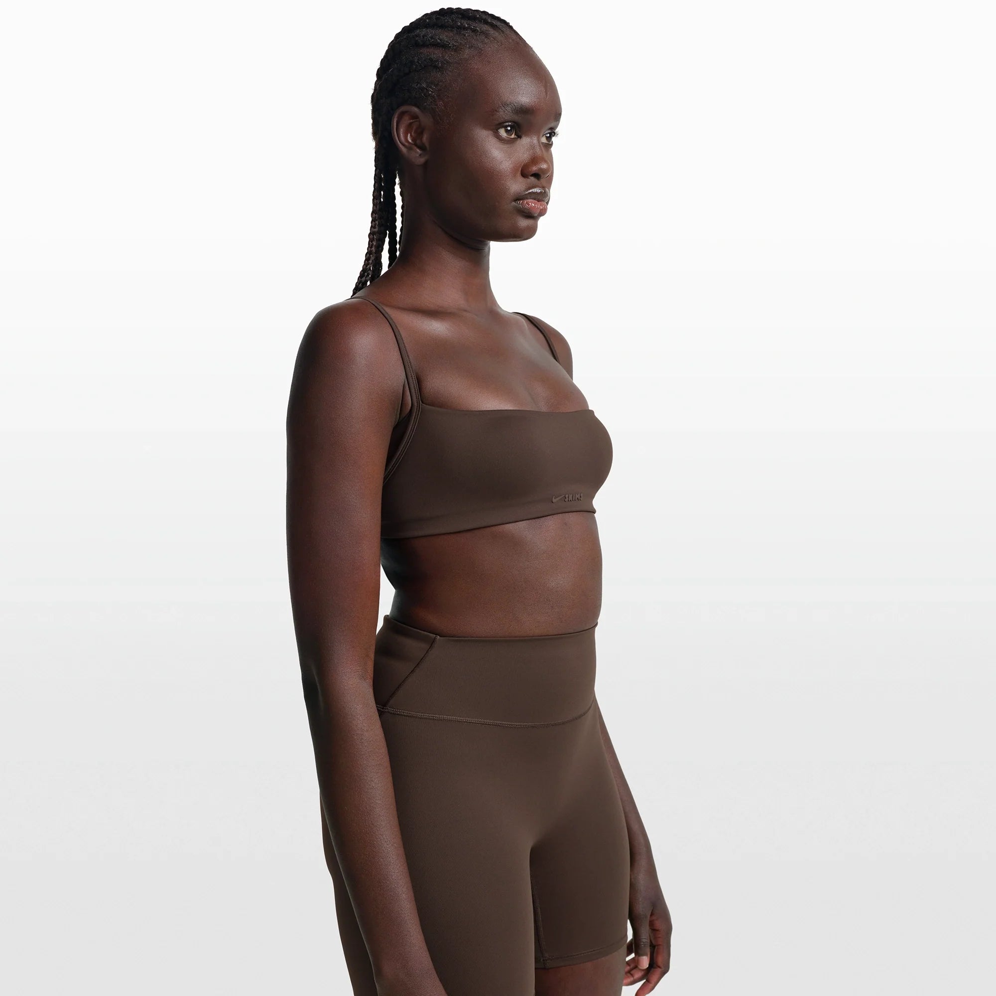 NikeSKIMS MATTE MICRO BRA | DARK SEPIA ON A MODEL FRONT VIEW @ | FOCUS: 0.0, 1.0, 0.9