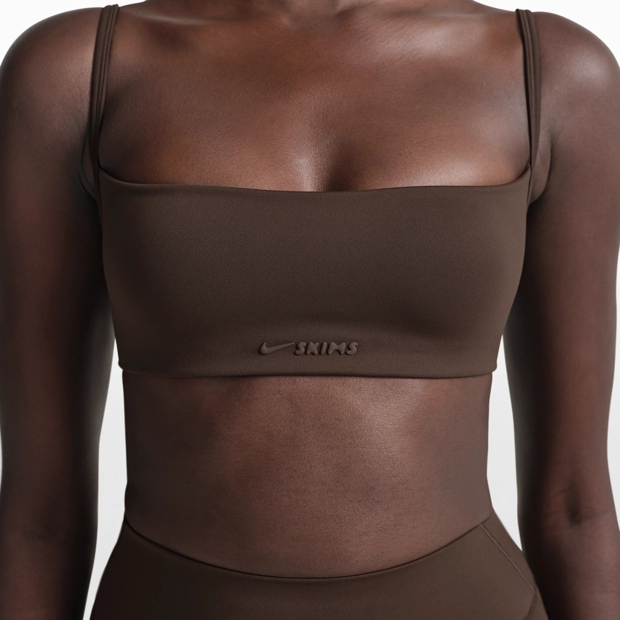 NikeSKIMS MATTE MICRO BRA | DARK SEPIA ON A MODEL FRONT VIEW @ | FOCUS: 0.0, 1.0, 0.9