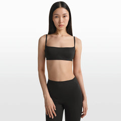 NikeSKIMS MATTE MICRO BRA | OBSIDIAN ON A MODEL FRONT VIEW @ | FOCUS: 0.0, 1.0, 0.9